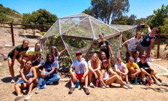 school year program students working in the garden